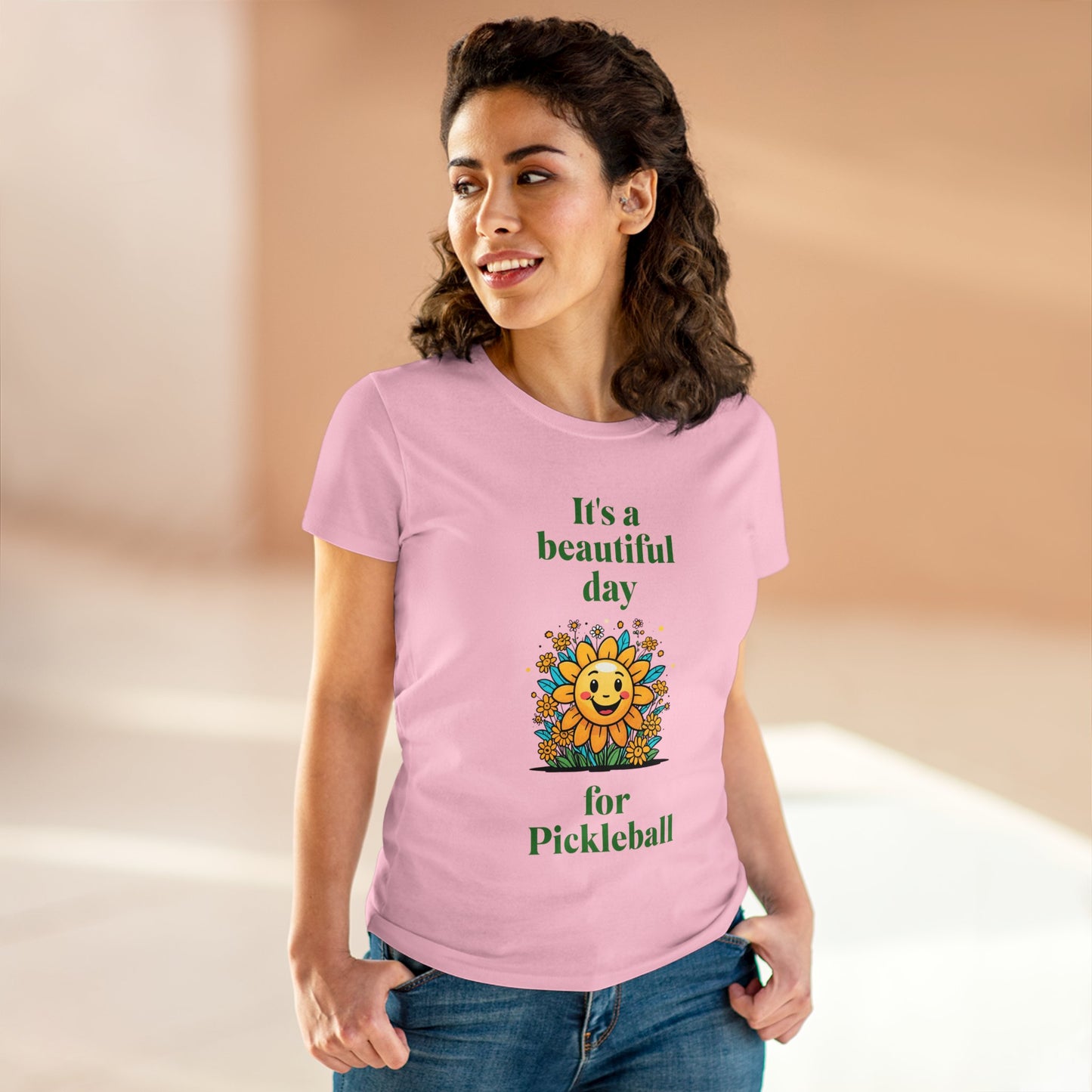 Women's Midweight Cotton Tee featuring a cheerful sun surrounded by flowers and the uplifting words, "It's a beautiful day for pickleball."