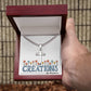 Your Guy will LOVE this Cuban Link Chain with Engraved Artisan Cross